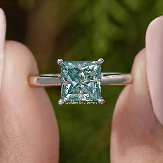 Princess-cut moissanite solitaire ring in silver with square light-blue center stone