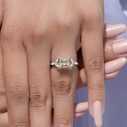 Princess-cut moissanite engagement ring with 925 sterling silver band, four-prong center