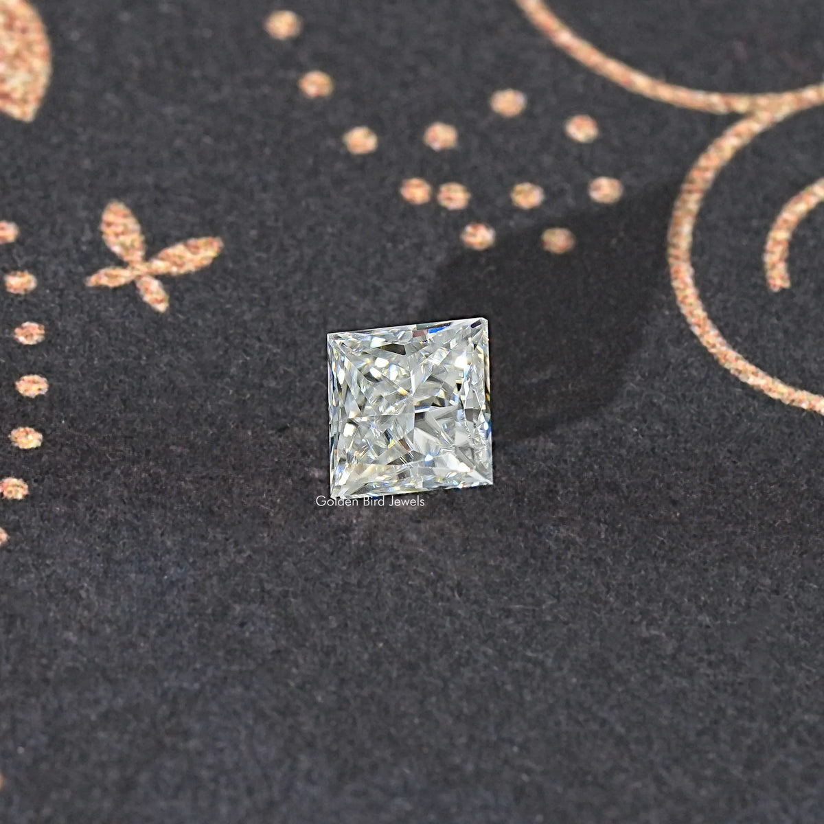 Princess-cut moissanite loose stone, clear square with crisp faceted sparkle.
