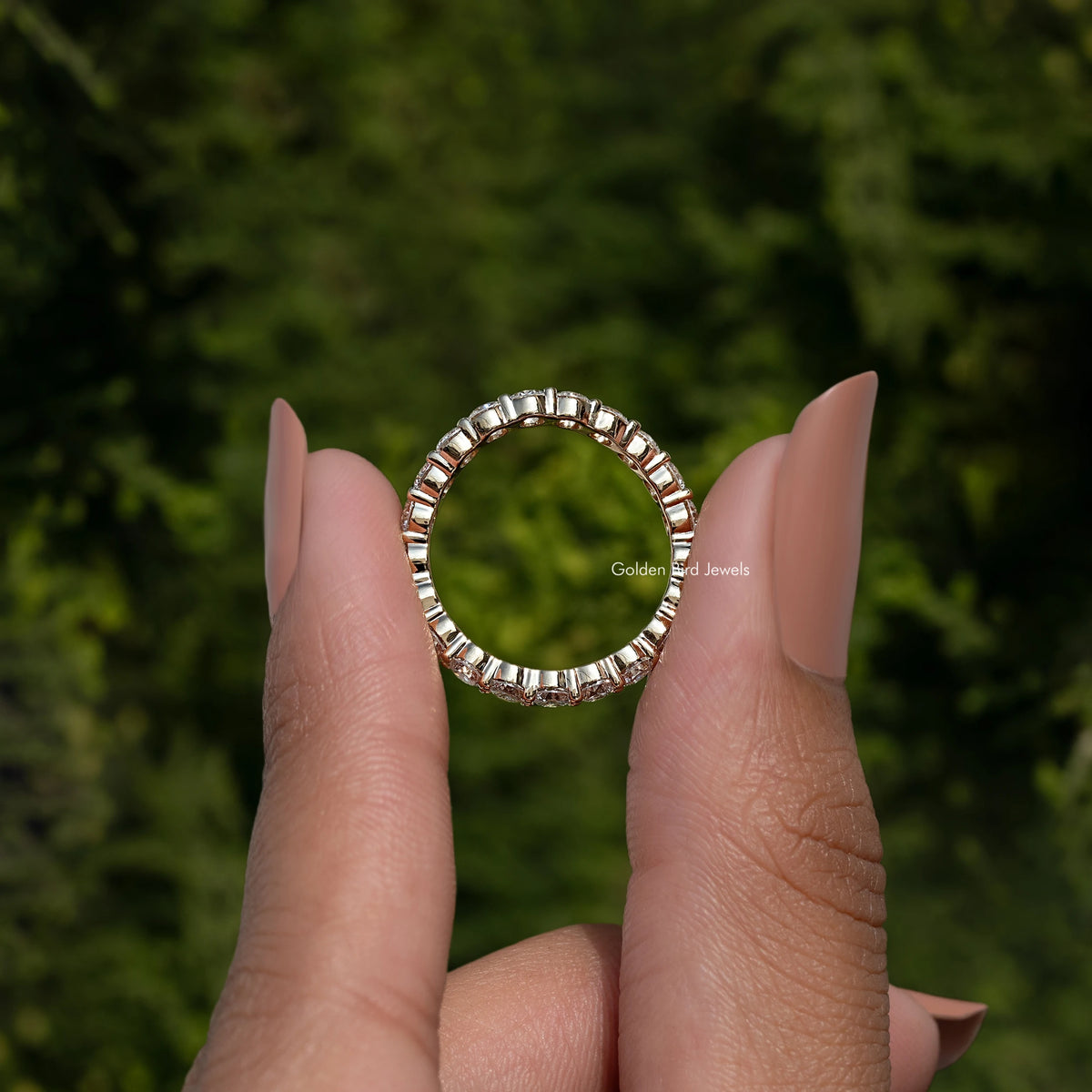 Silver-toned eternity wedding band with round-cut lab diamonds in full circle