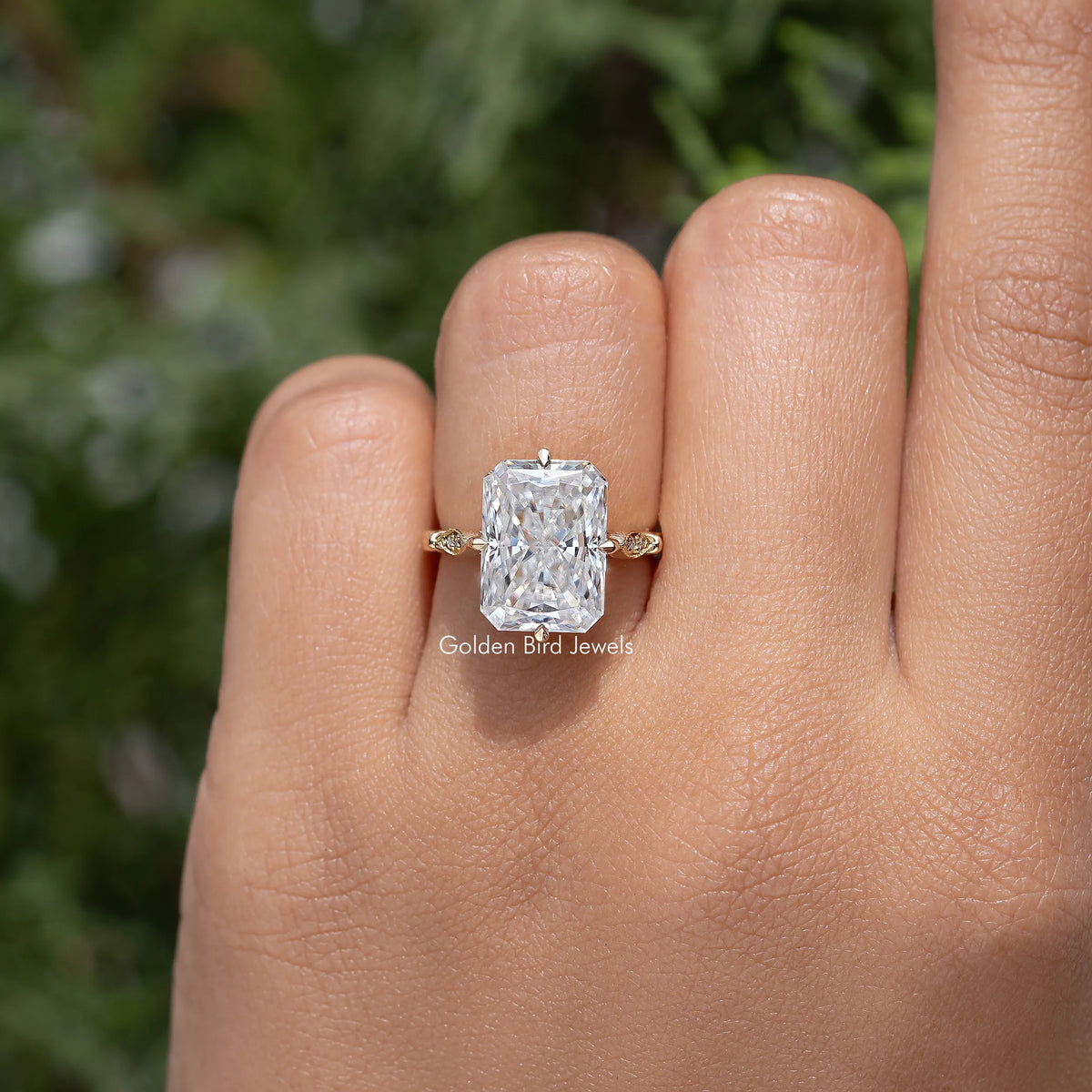 Rectangular center stone engagement ring with slim band, hand view