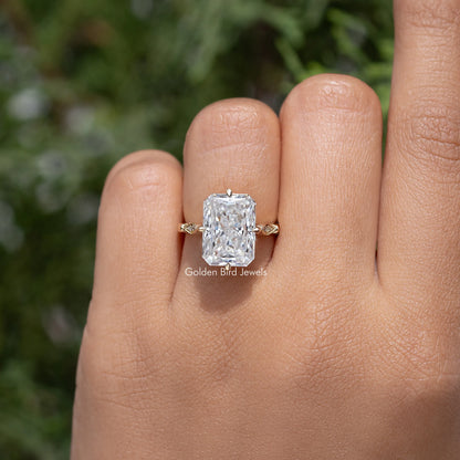 Rectangular center stone engagement ring with slim band, hand view