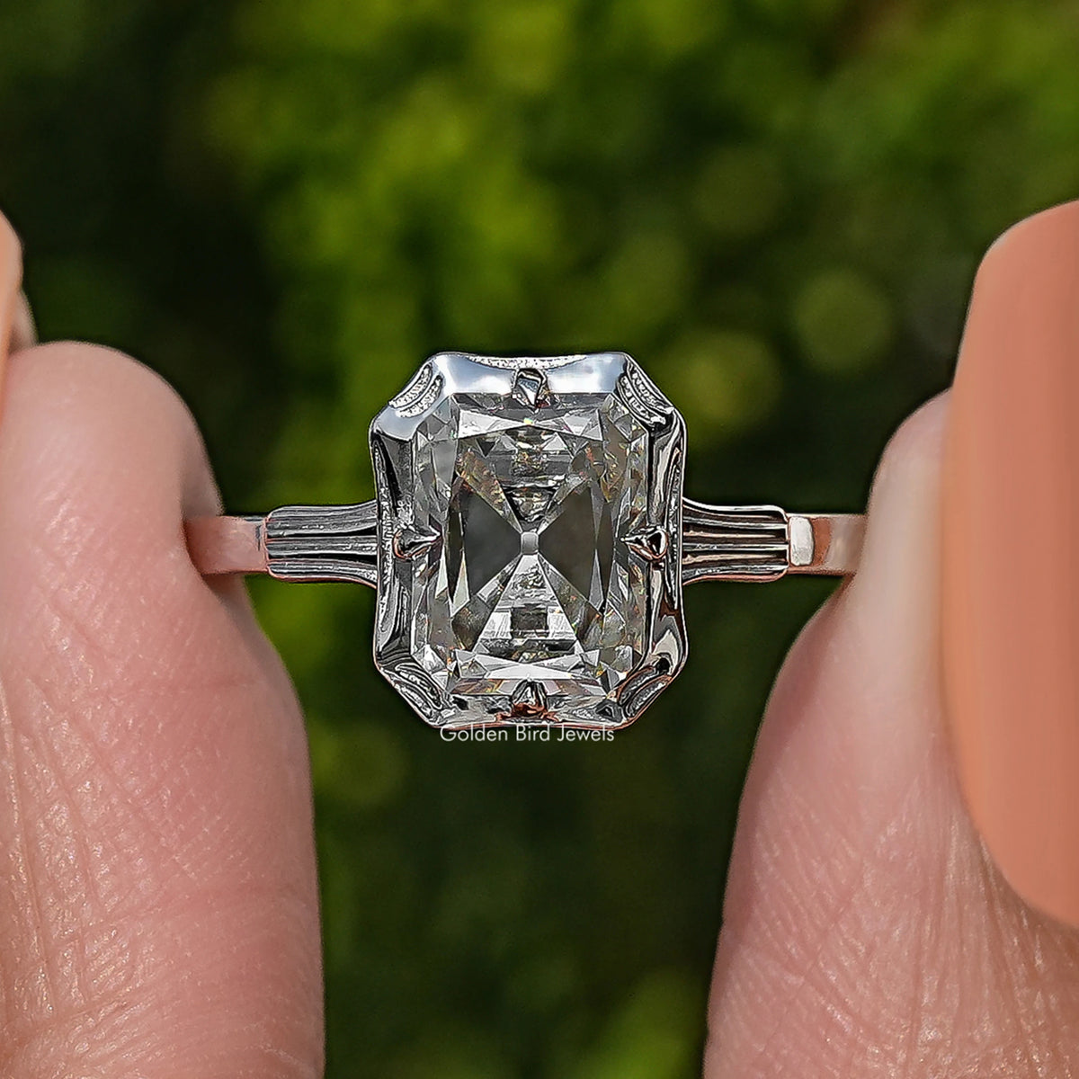 Close-up of 925 sterling silver solitaire ring with radiant-cut moissanite centerpiece