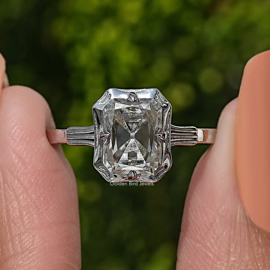 Close-up of 925 sterling silver solitaire ring with radiant-cut moissanite centerpiece