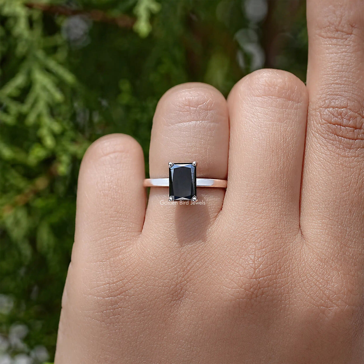 Silver ring with square black radiant-cut moissanite center and hidden halo setting