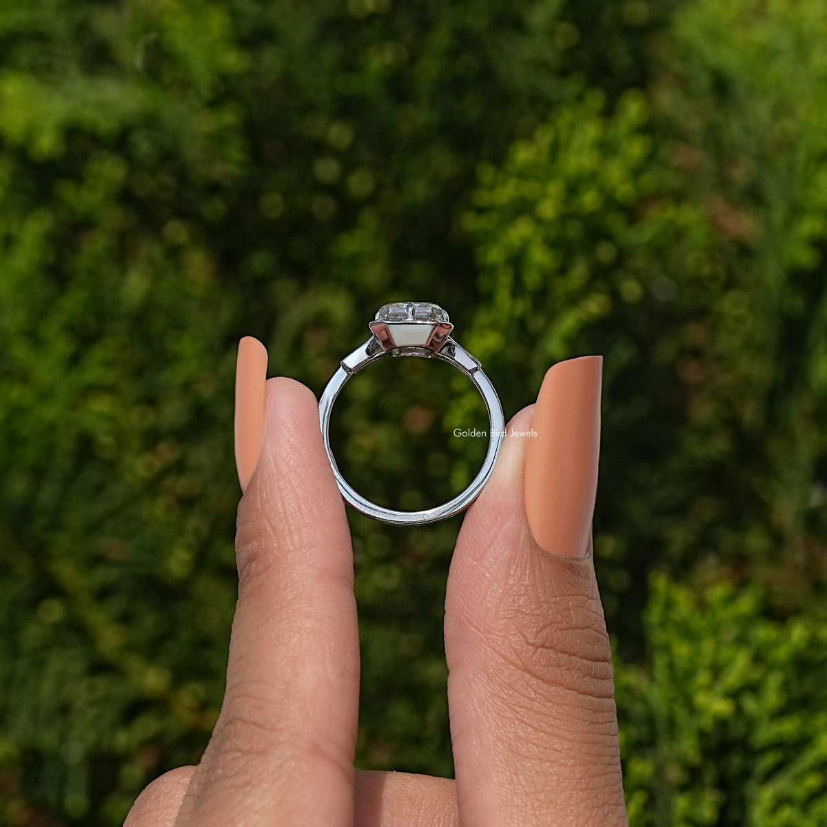 925 sterling silver radiant-cut moissanite solitaire ring, top view on finger