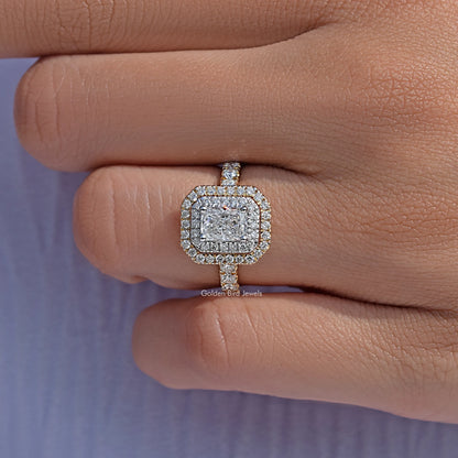 Radiant cut diamond double halo engagement ring on a finger