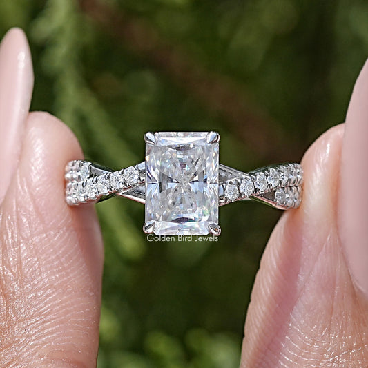 Radiant moissanite twisted accent wedding ring in sterling silver