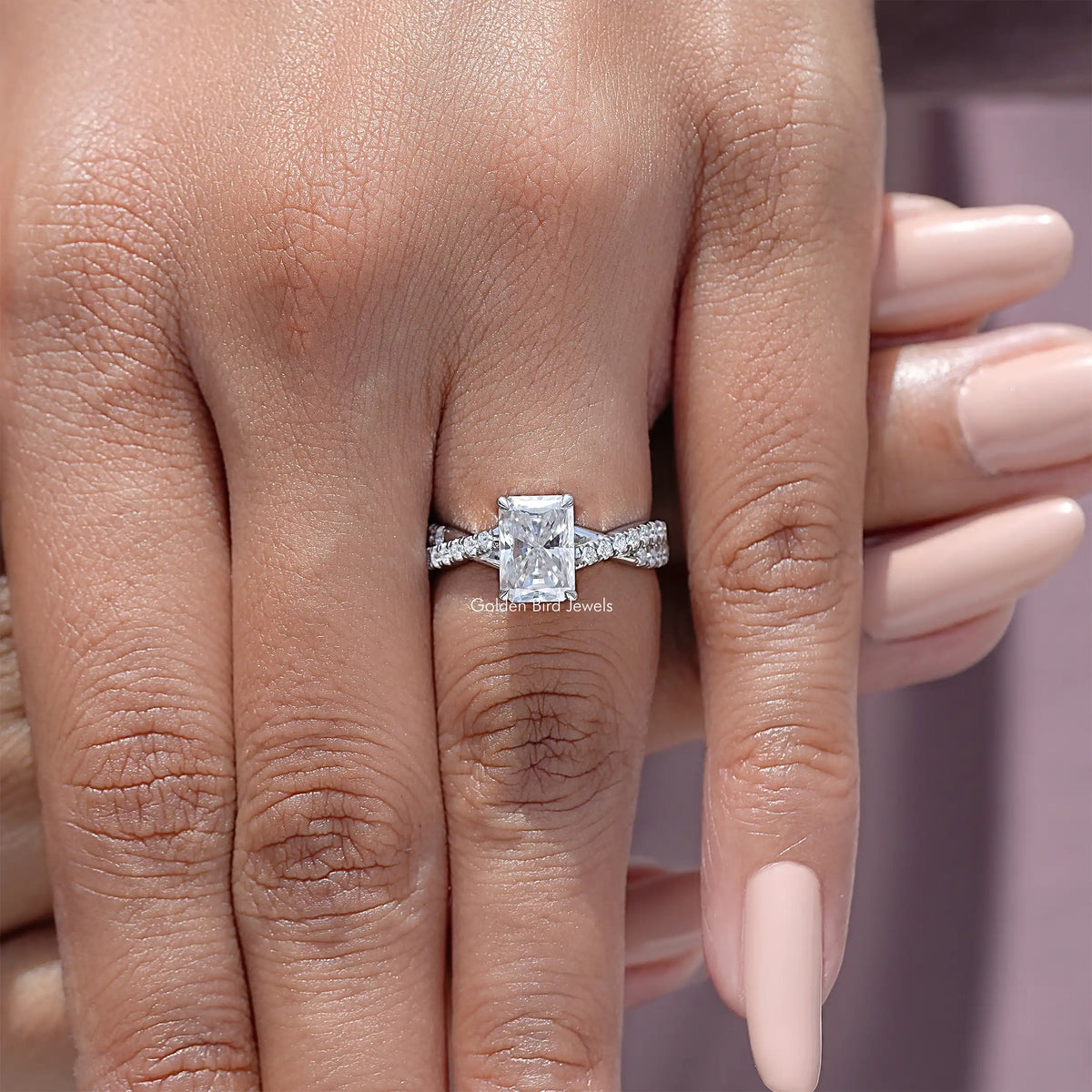 Sterling silver twisted wedding ring with square moissanite center and side accents