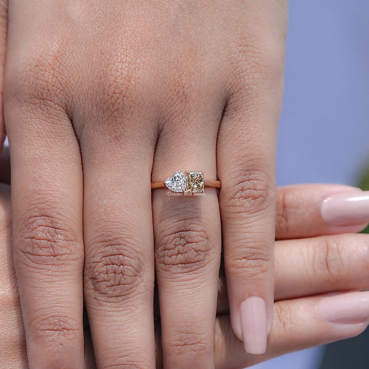 Close view of Radiant And Heart Moissanite Halo Engagement Ring   	
