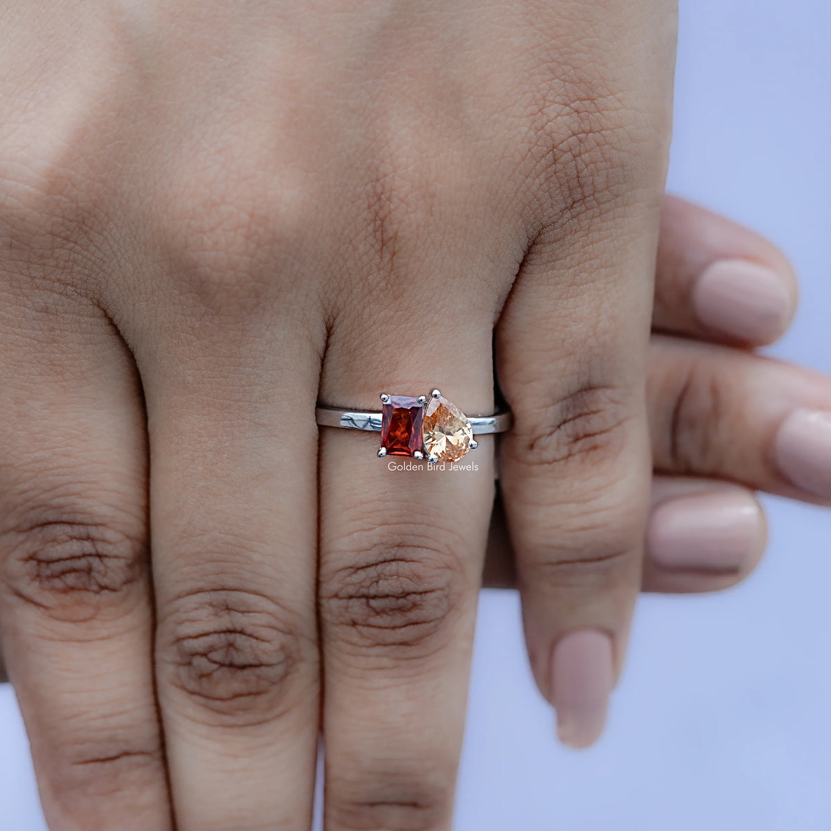 In finger view of Radiant And Pear Toi et Moi Ring