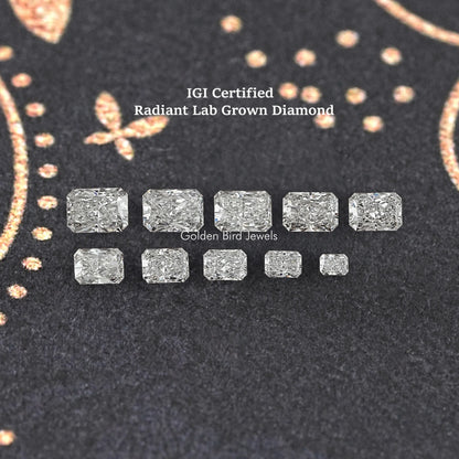 Radiant cut lab-grown diamonds arranged in two rows on display