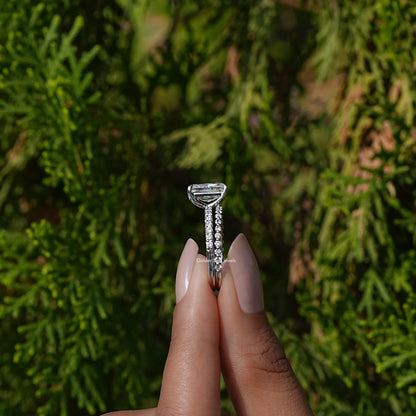 Side View A Radiant Cut Diamond Bridal Ring Set in a two fingers
