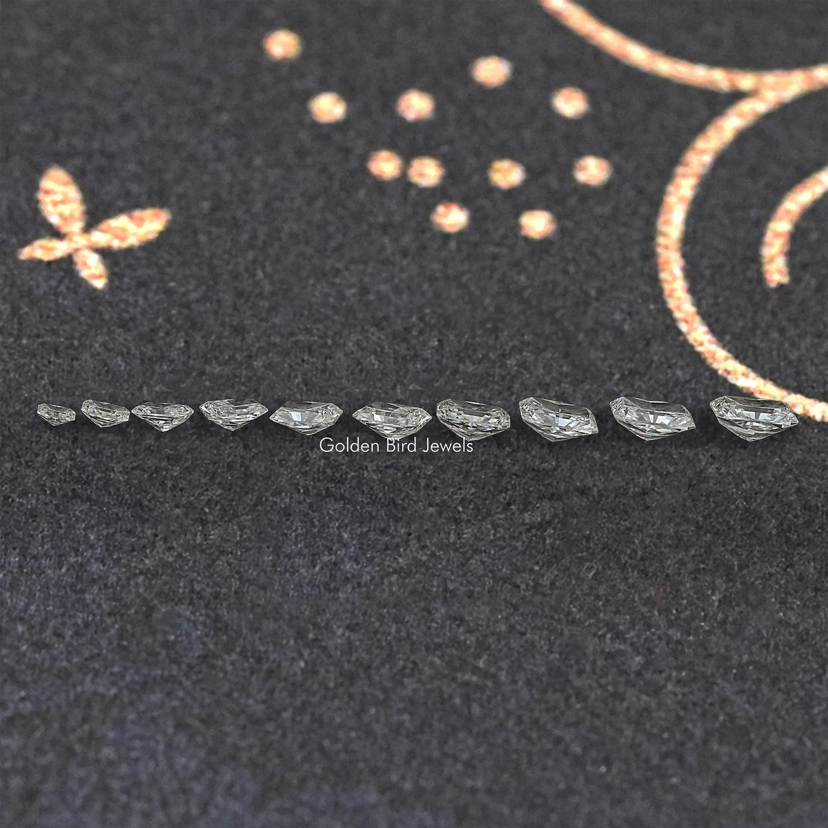Row of loose radiant-cut lab diamonds, clear faceted stones