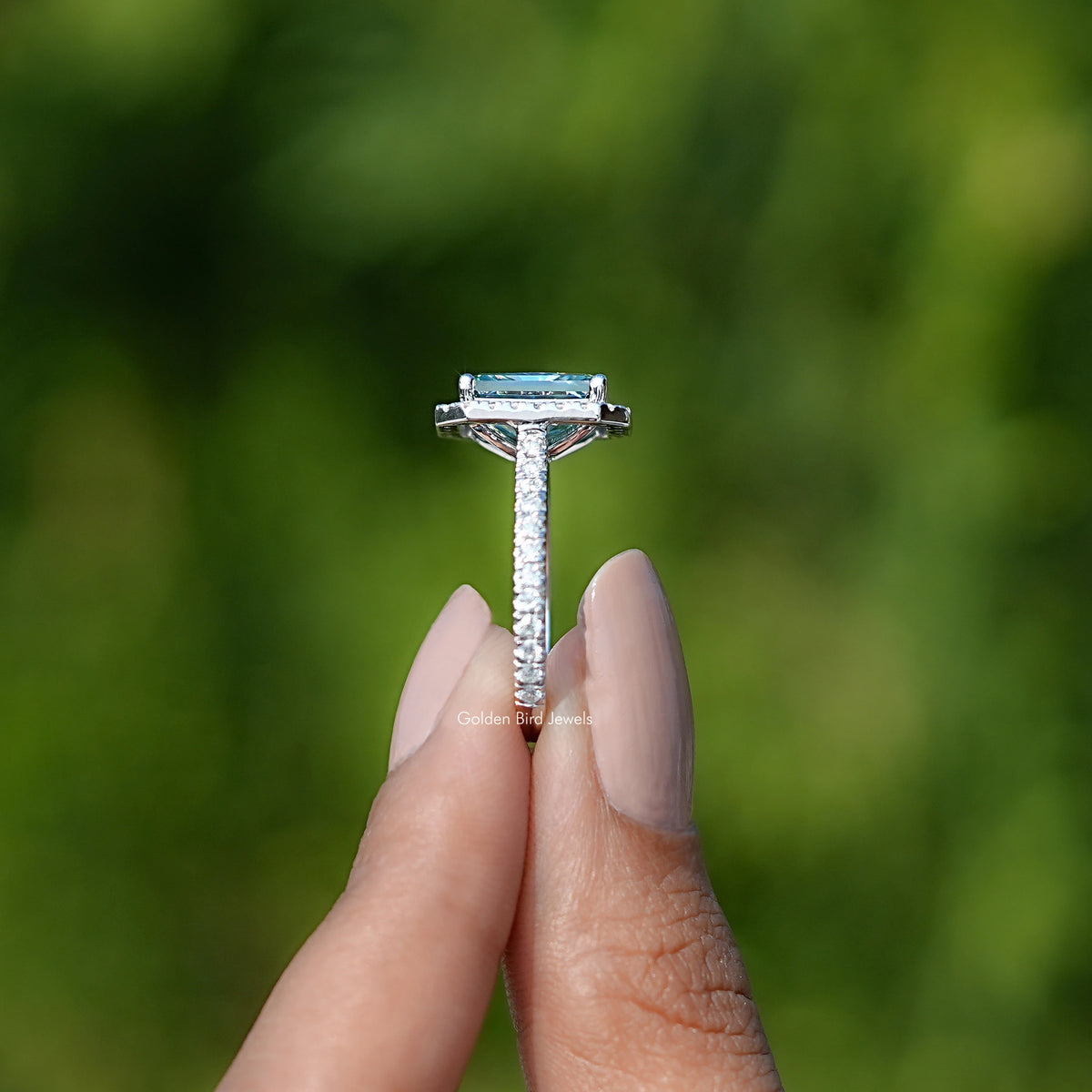 Side View of Engagement ring crafted With Blue Green Radiant Cut moissanite 