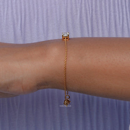 Side view of lab Radiant Cut Bracelet In yellow Gold