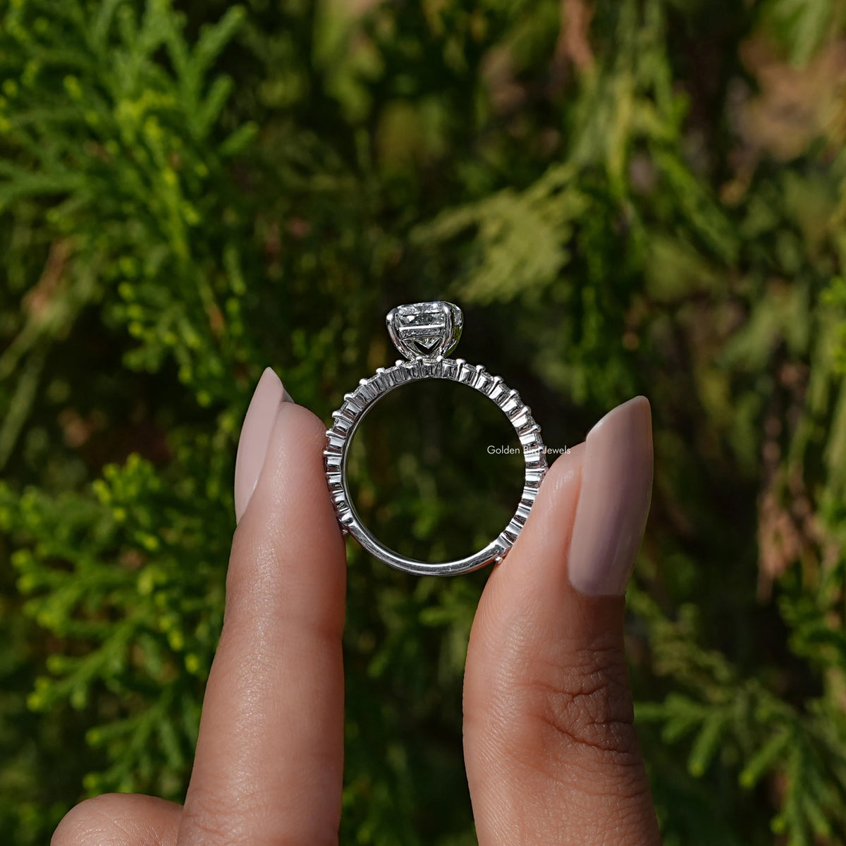 Back View A Radiant Cut Diamond Ring Set in A two fingers
