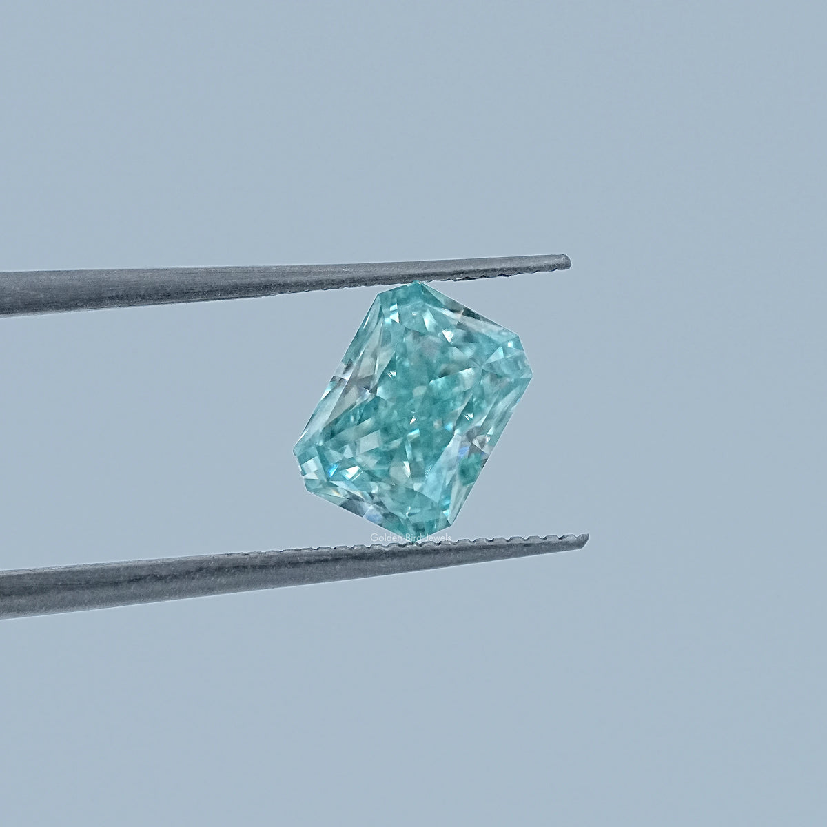 In Tweezer View Of Radiant Cut Loose Moissanite