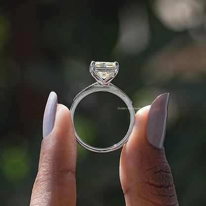 Back View of Radiant Cut Moissanite Engagement Ring In two fingers