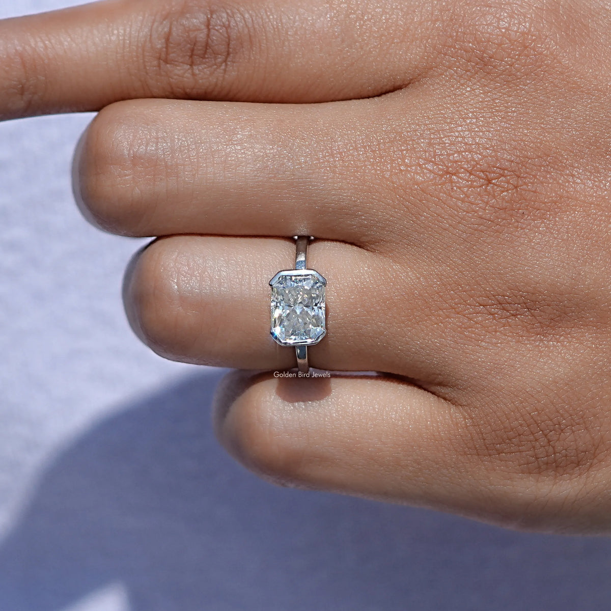 View of Radiant Cut Moissanite Solitaire Ring in prongs setting 