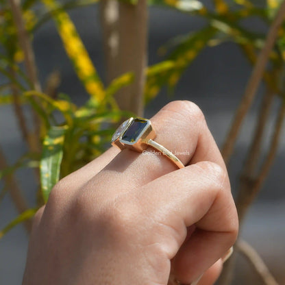 Side View of Bezel Set Radiant And Pear Cut Moissanite Ring In finger