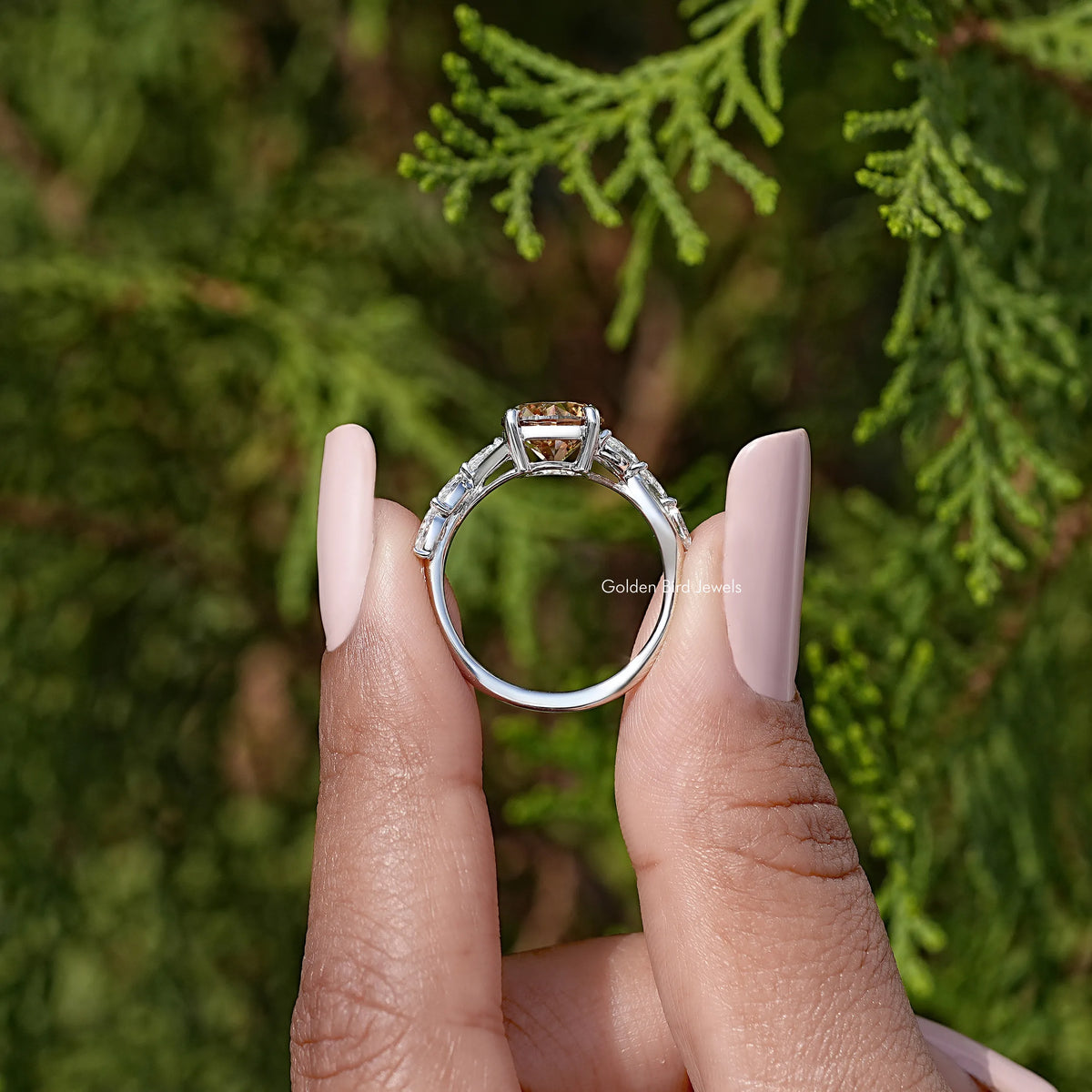 Inside view of sterling silver ring with round yellow moissanite prong setting