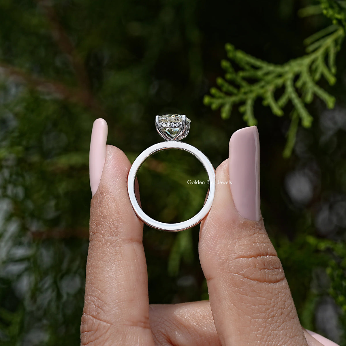 Sterling silver ring with round hidden-halo setting, top view