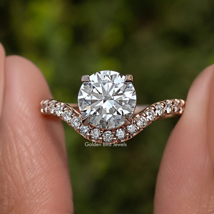 Lab-grown round-cut engagement ring with curved pavé band