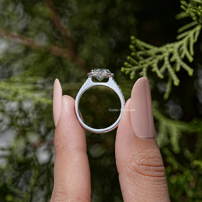 Round cut moissanite accent ring in 925 sterling silver, side view