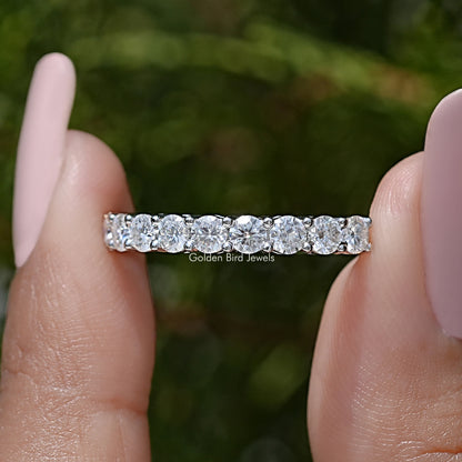 Half eternity moissanite band with clear round-cut stones on silver-tone ring