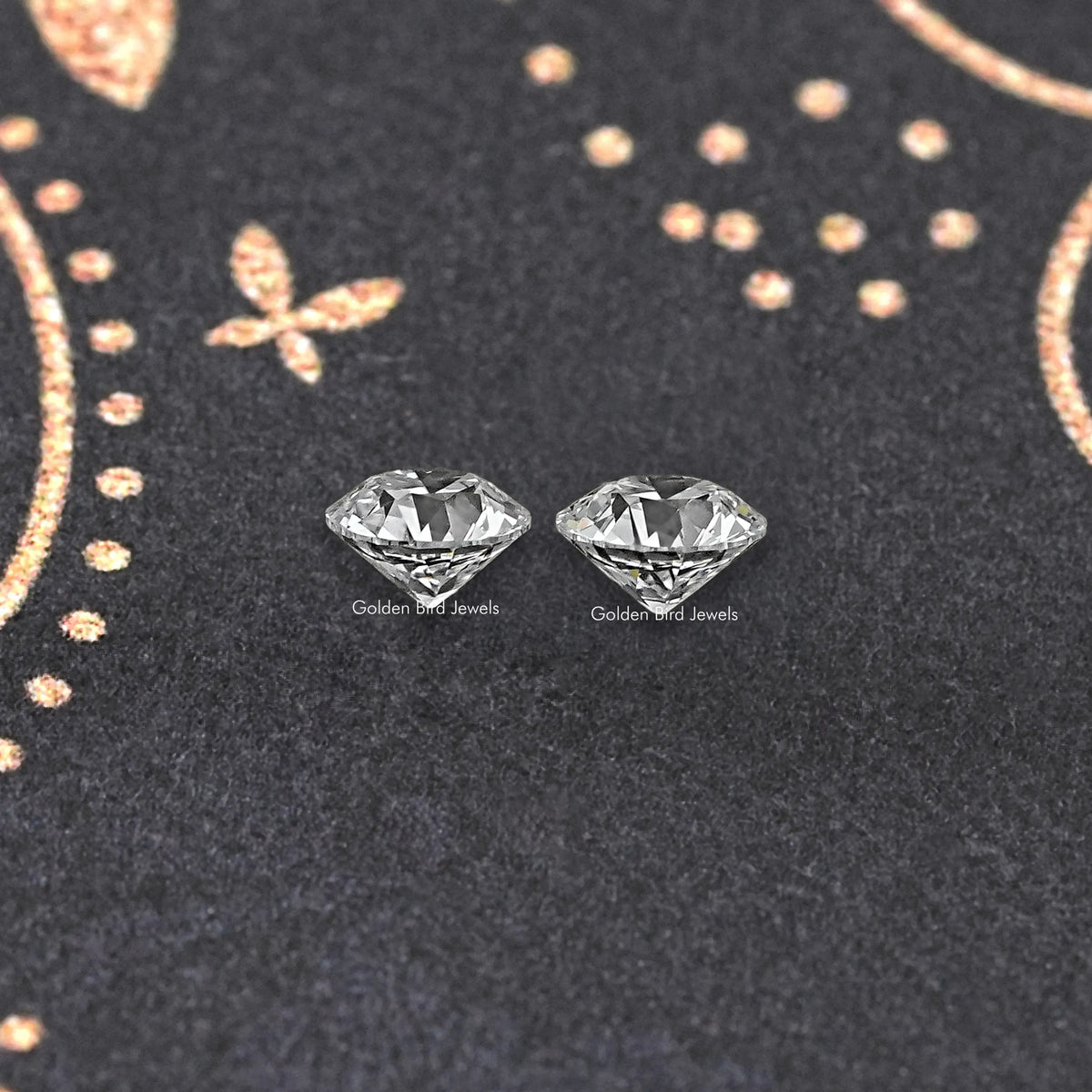 Matching stud earrings with two round old European diamonds, side view