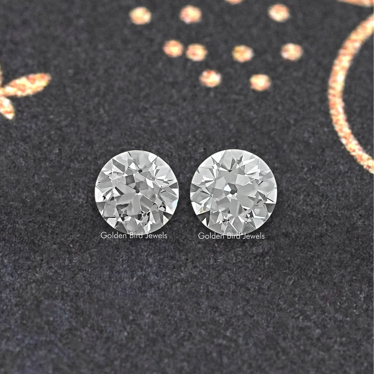 Round old European diamond stud earrings, matching pair with prong-set stones