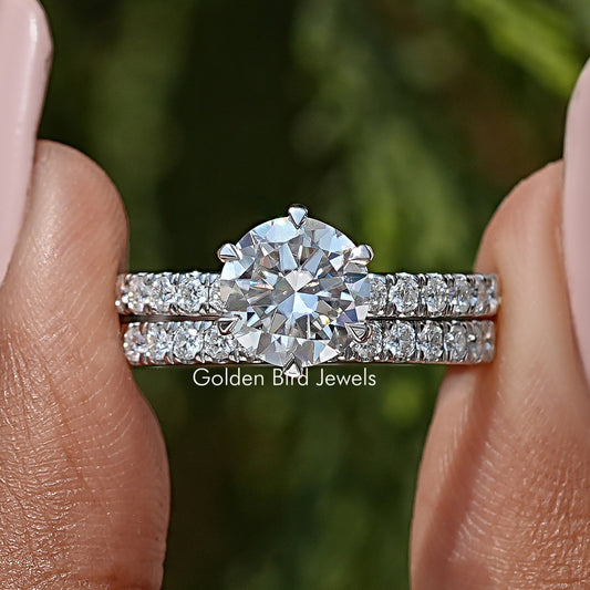 Round cut moissanite engagement ring set with pavé band