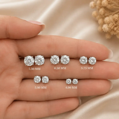 Round moissanite stud earrings; round stones with size labels 7.30, 6.50, 5.75, 5.00, 4.00 mm.