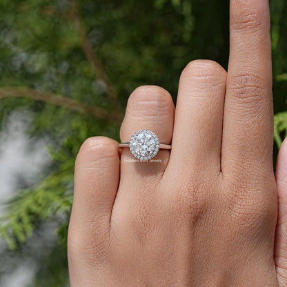 Round halo moissanite promise ring on finger, 925 sterling silver