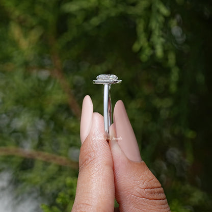 Top view of round moissanite halo ring in 925 sterling silver with prongs