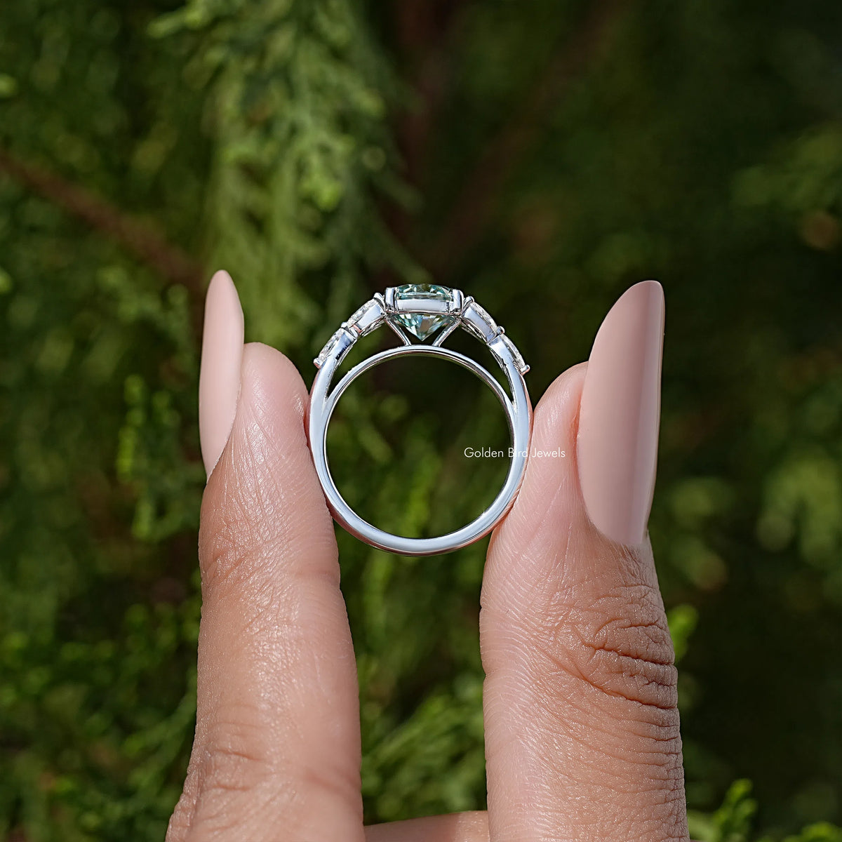 Moissanite engagement ring in sterling silver, round center stone, arched setting