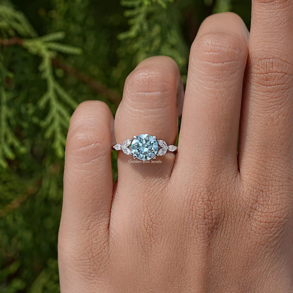Sterling silver moissanite engagement ring, round center with small side stones