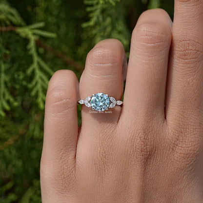 Sterling silver moissanite engagement ring, round center with small side stones