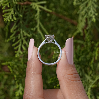 Sterling silver round-cut moissanite solitaire ring, view from above, prong setting