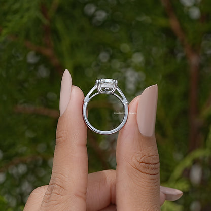 Elongated cushion solitaire ring with split shank, viewed from the back