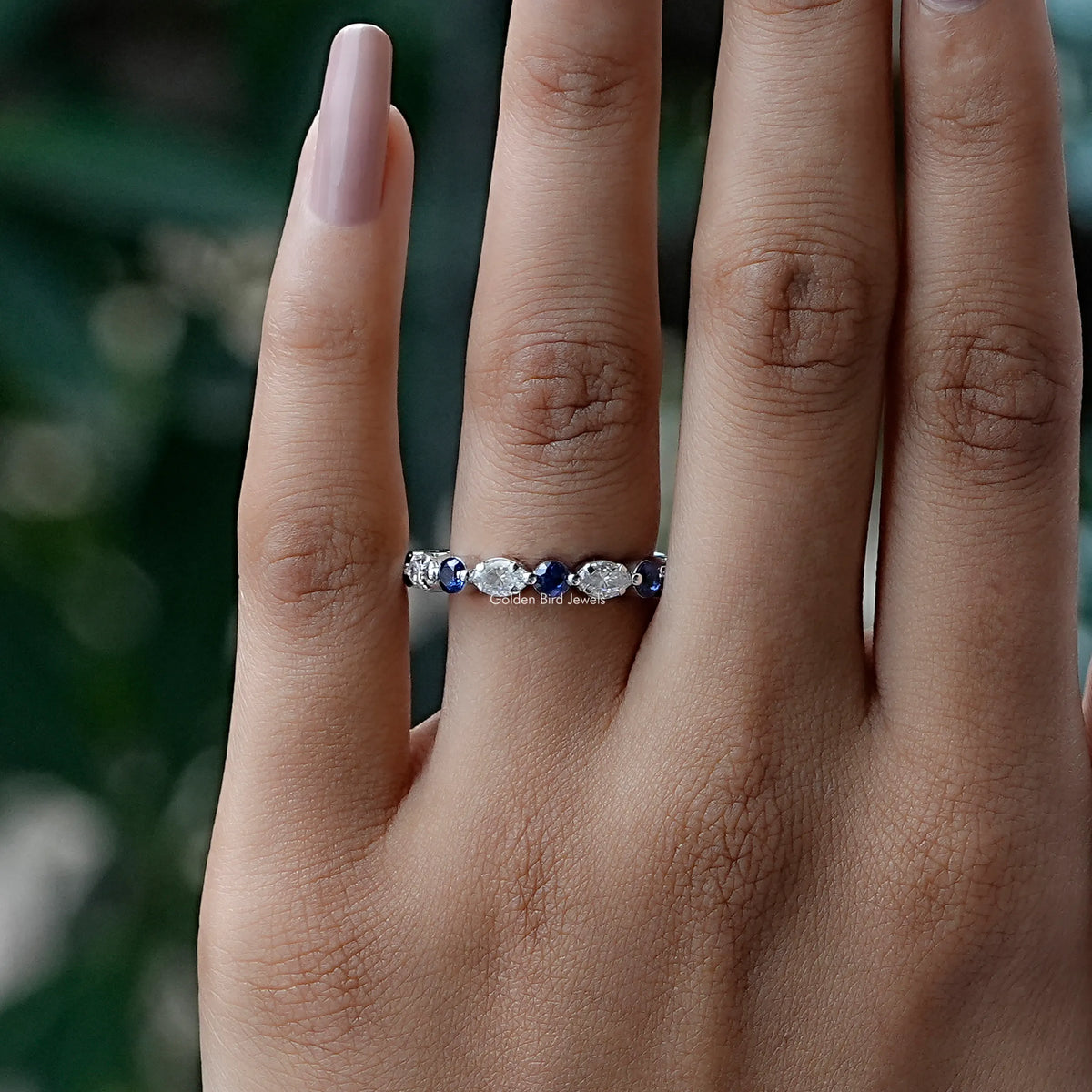 View of Round And Marquise Cut Moissanite Eternity Band In White Gold