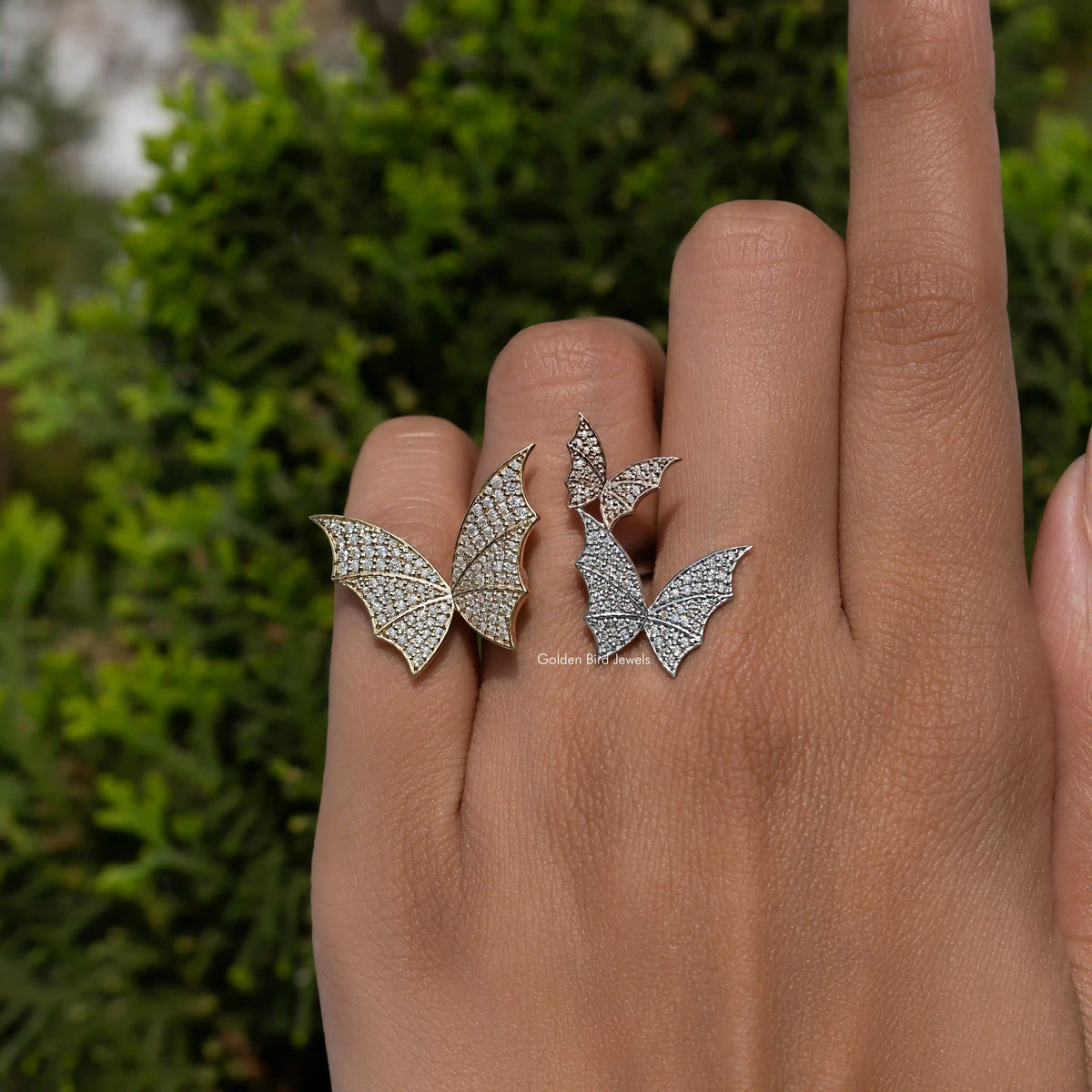 Silver butterfly cluster ring with three wing motifs and round stones