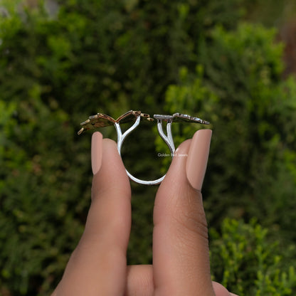 Silver butterfly cocktail ring showing shank and wing motifs with round stones