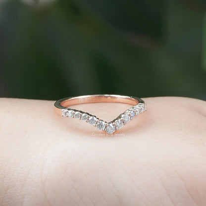 Chevron eternity band ring with round lab diamonds, top view on palm
