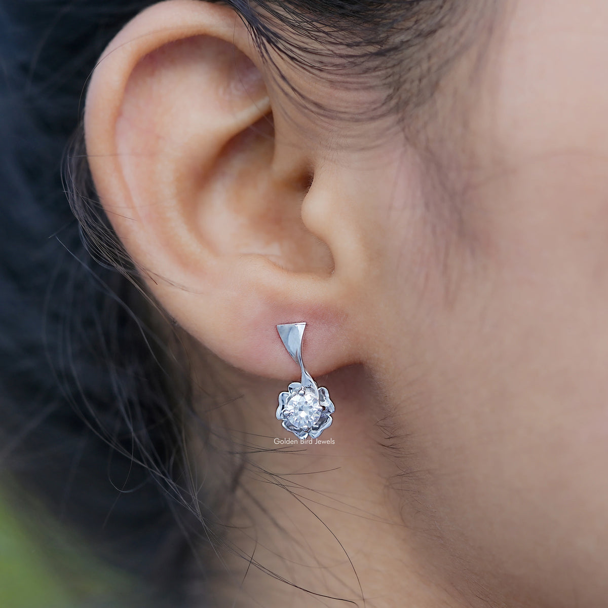 Silver colorless moissanite cluster earrings with triangular top, side view