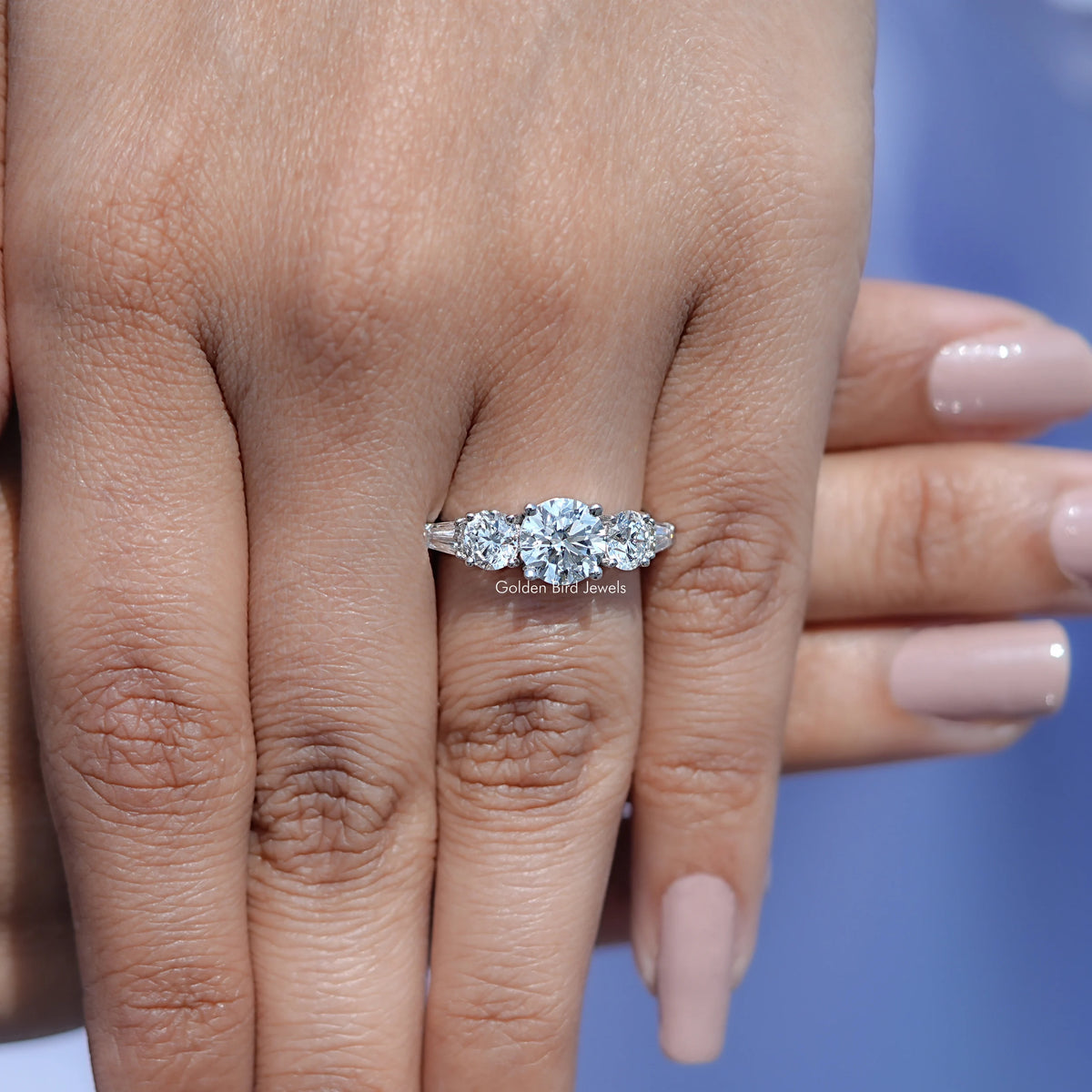 Five-stone 14K white gold diamond ring with baguette-cut center and side stones