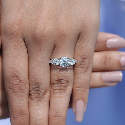 Five-stone 14K white gold diamond ring with baguette-cut center and side stones
