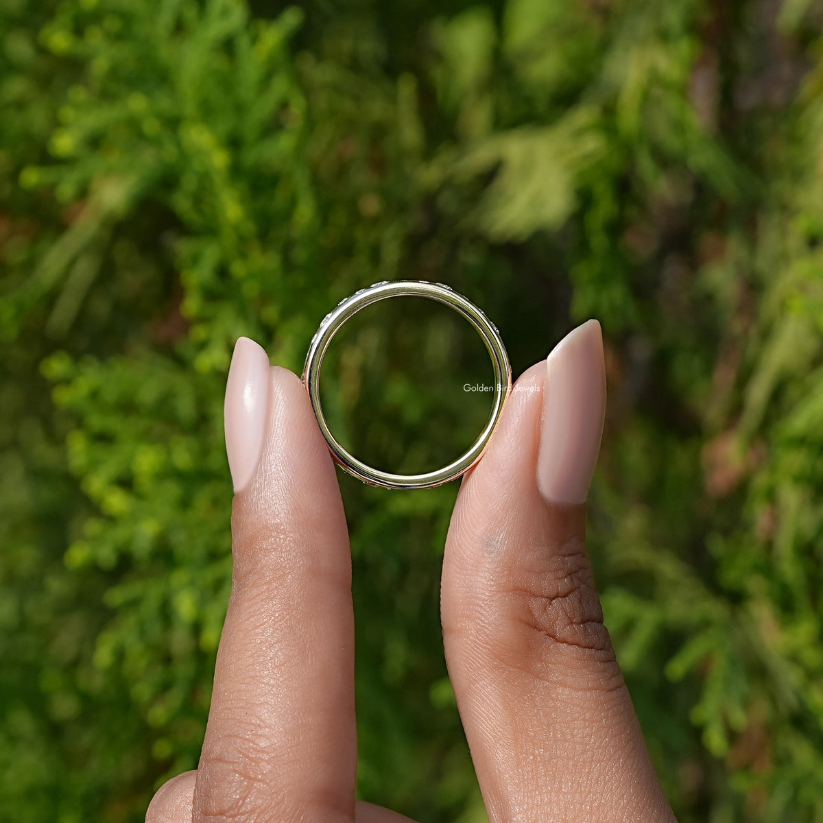 Back View of Round Cut Flush Set Eternity Wedding Band In two fingers
