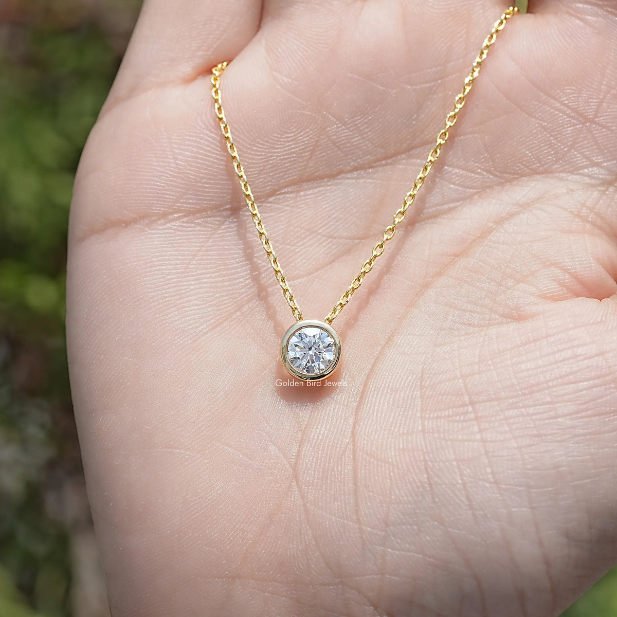 Top View of Round Cut Bezel Set Solitaire Pendant